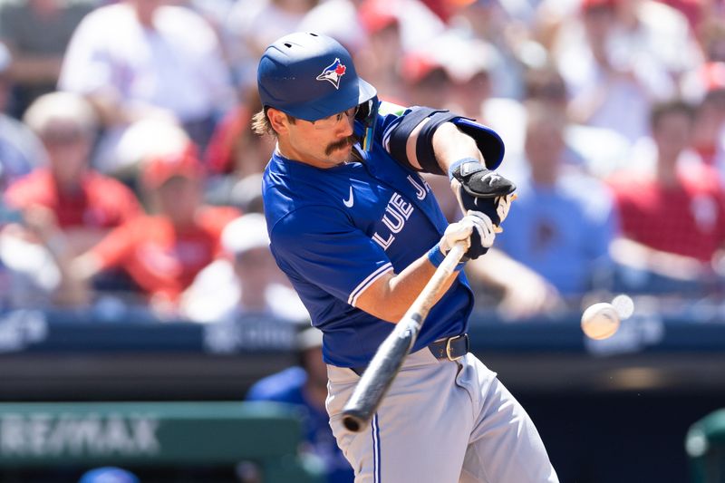 May 8, 2024; Philadelphia, Pennsylvania, USA; Toronto Blue Jays outfielder Davis Schneider (36) hits an RBI single during the sixth inning against the Philadelphia Phillies at Citizens Bank Park. Mandatory Credit: Bill Streicher-USA TODAY Sports