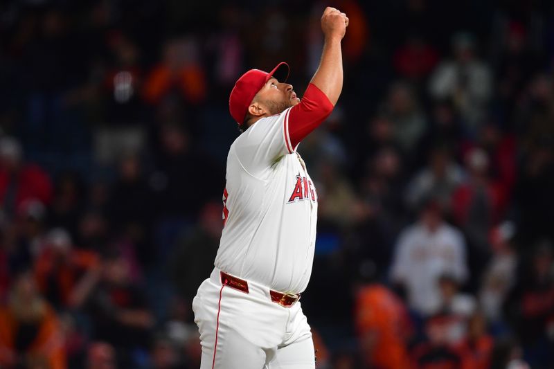 Apr 23, 2024; Anaheim, California, USA; Los Angeles Angels pitcher Carlos Estévez (53) celebrates the victory against the Baltimore Orioles at Angel Stadium. Mandatory Credit: Gary A. Vasquez-USA TODAY Sports