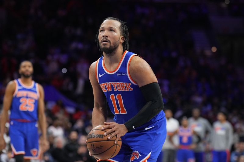 PHILADELPHIA, PA - JANUARY 15: Jalen Brunson #11 of the New York Knicks shoots a free throw during the game against the Philadelphia 76ers on January 15, 2025 at the Wells Fargo Center in Philadelphia, Pennsylvania NOTE TO USER: User expressly acknowledges and agrees that, by downloading and/or using this Photograph, user is consenting to the terms and conditions of the Getty Images License Agreement. Mandatory Copyright Notice: Copyright 2025 NBAE (Photo by Jesse D. Garrabrant/NBAE via Getty Images)