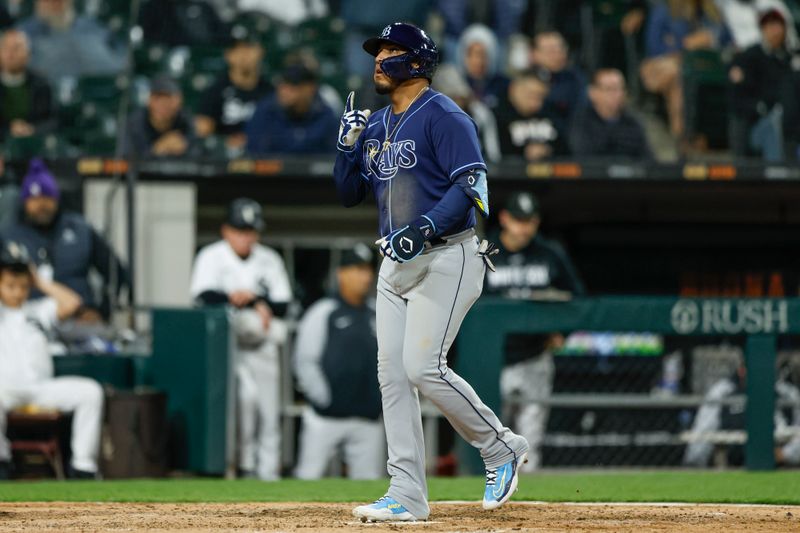 Apr 28, 2023; Chicago, Illinois, USA; Tampa Bay Rays third baseman Isaac Paredes (17) crosses home plate after hitting a solo home run against the Chicago White Sox during the ninth inning at Guaranteed Rate Field. Mandatory Credit: Kamil Krzaczynski-USA TODAY Sports