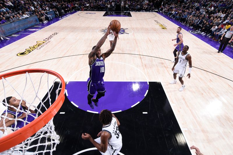 SACRAMENTO, CA - NOVEMBER 24: DeMar DeRozan #10 of the Sacramento Kings goes up for the rebound during the game against the Brooklyn Nets on November 24, 2024 at Golden 1 Center in Sacramento, California. NOTE TO USER: User expressly acknowledges and agrees that, by downloading and or using this Photograph, user is consenting to the terms and conditions of the Getty Images License Agreement. Mandatory Copyright Notice: Copyright 2024 NBAE (Photo by Rocky Widner/NBAE via Getty Images)