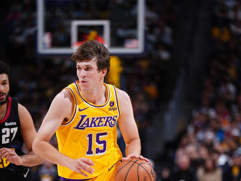 DENVER, CO - APRRIL 22: Austin Reaves #15 of the Los Angeles Lakers drives to the basket during the game against the Denver Nuggets during Round 1 Game 2 of the 2024 NBA Playoffs on April 22, 2024 at the Ball Arena in Denver, Colorado. NOTE TO USER: User expressly acknowledges and agrees that, by downloading and/or using this Photograph, user is consenting to the terms and conditions of the Getty Images License Agreement. Mandatory Copyright Notice: Copyright 2024 NBAE (Photo by Garrett Ellwood/NBAE via Getty Images)