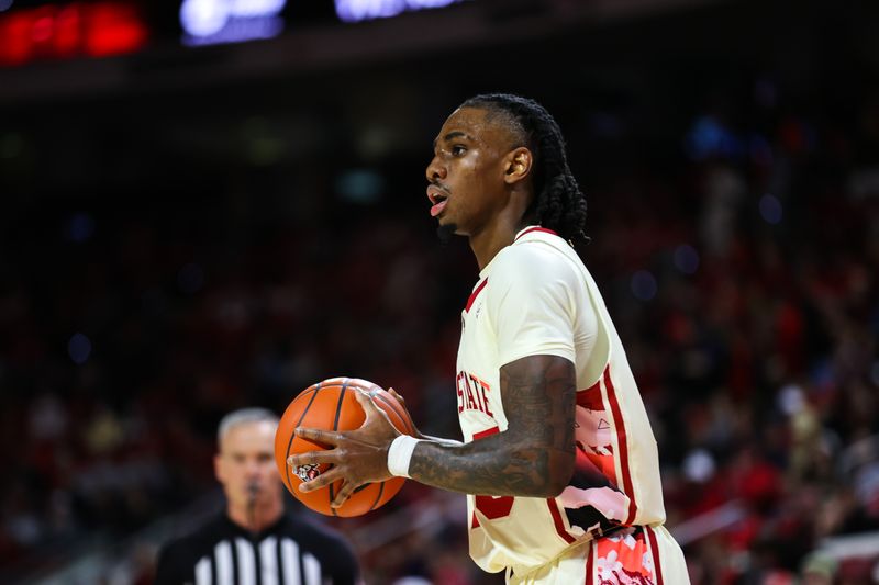 Feb 4, 2023; Raleigh, North Carolina, USA; North Carolina State Wolfpack forward Greg Gantt (23) looks to make a play during first half against Georgia Tech Yellow Jackets at PNC Arena.  PNC Arena. Mandatory Credit: Jaylynn Nash-USA TODAY Sports