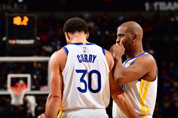 PHOENIX, AZ - DECEMBER 12: Stephen Curry #30 and Chris Paul #3 of the Golden State Warriors talk during the game against the Phoenix Suns on December 12, 2023 at Footprint Center in Phoenix, Arizona. NOTE TO USER: User expressly acknowledges and agrees that, by downloading and or using this photograph, user is consenting to the terms and conditions of the Getty Images License Agreement. Mandatory Copyright Notice: Copyright 2023 NBAE (Photo by Barry Gossage/NBAE via Getty Images)