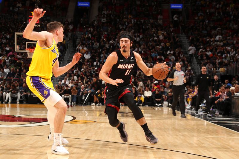 MIAMI, FL - DECEMBER 4: Jaime Jaquez Jr. #11 of the Miami Heat handles the ball during the game against the Los Angeles Lakers on December 4, 2024 at Kaseya Center in Miami, Florida. NOTE TO USER: User expressly acknowledges and agrees that, by downloading and or using this Photograph, user is consenting to the terms and conditions of the Getty Images License Agreement. Mandatory Copyright Notice: Copyright 2024 NBAE (Photo by Issac Baldizon/NBAE via Getty Images)