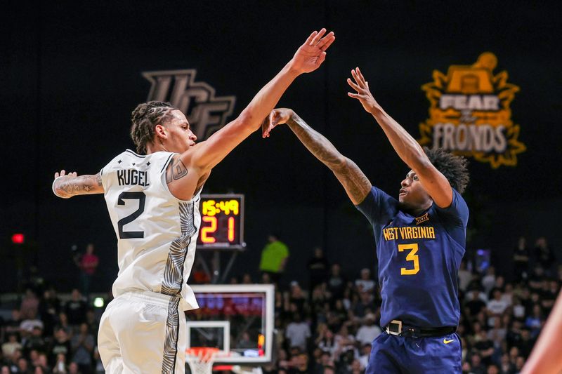 Feb 14, 2026; Orlando, Florida, USA; West Virginia Mountaineers guard Honor Huff (3) shoots a three-point basket against UCF Knights guard Riley Kugel (2) during the first half at Addition Financial Arena. Mandatory Credit: Mike Watters-Imagn Images