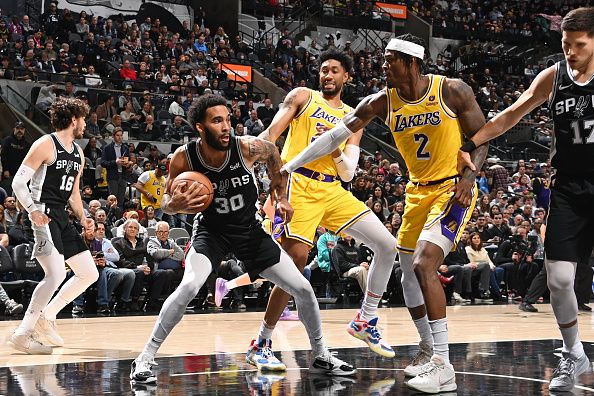 SAN ANTONIO, TX - DECEMBER 13: Julian Champagnie #30 of the San Antonio Spurs handles the ball during the game against the Los Angeles Lakers on December 13, 2023 at the Frost Bank Center in San Antonio, Texas. NOTE TO USER: User expressly acknowledges and agrees that, by downloading and or using this photograph, user is consenting to the terms and conditions of the Getty Images License Agreement. Mandatory Copyright Notice: Copyright 2023 NBAE (Photos by Andrew D. Bernstein/NBAE via Getty Images)