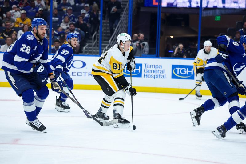 Dec 4, 2025; Tampa, Florida, USA; Pittsburgh Penguins center Ben Kindel (81) scores a gaol against the Tampa Bay Lightning in the second period at Benchmark International Arena. Mandatory Credit: Nathan Ray Seebeck-Imagn Images