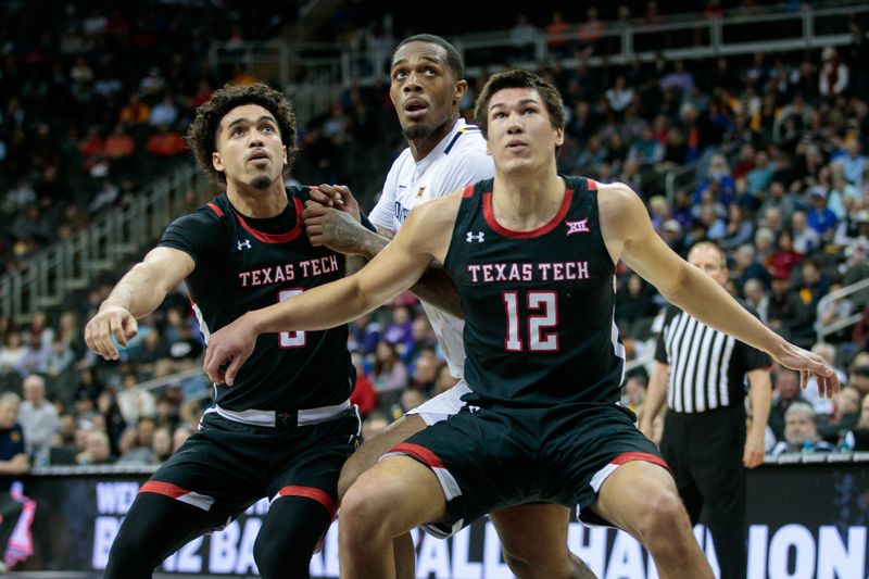 Mar 8, 2023; Kansas City, MO, USA; Texas Tech Red Raiders forward Daniel Batcho (12) blocks out after a free throw during the first half against the West Virginia Mountaineers at T-Mobile Center. Mandatory Credit: William Purnell-USA TODAY Sports