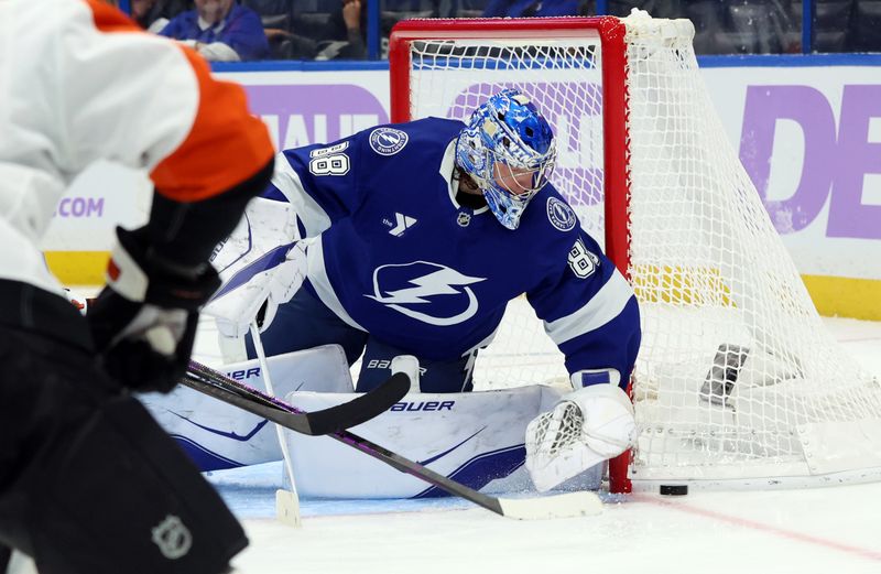 Nov 24, 2025; Tampa, Florida, USA; Tampa Bay Lightning goaltender Andrei Vasilevskiy (88) defends the puck during the second period at Benchmark International Arena. Mandatory Credit: Kim Klement Neitzel-Imagn Images