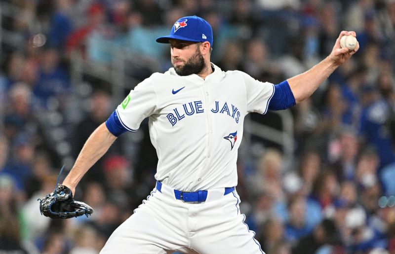 Apr 10, 2024; Toronto, Ontario, CAN; Toronto Blue Jays relief pitcher Tim Mayza (58) delivers a pitch against the Seattle Mariners in the 10th inning at Rogers Centre. Mandatory Credit: Dan Hamilton-USA TODAY Sports