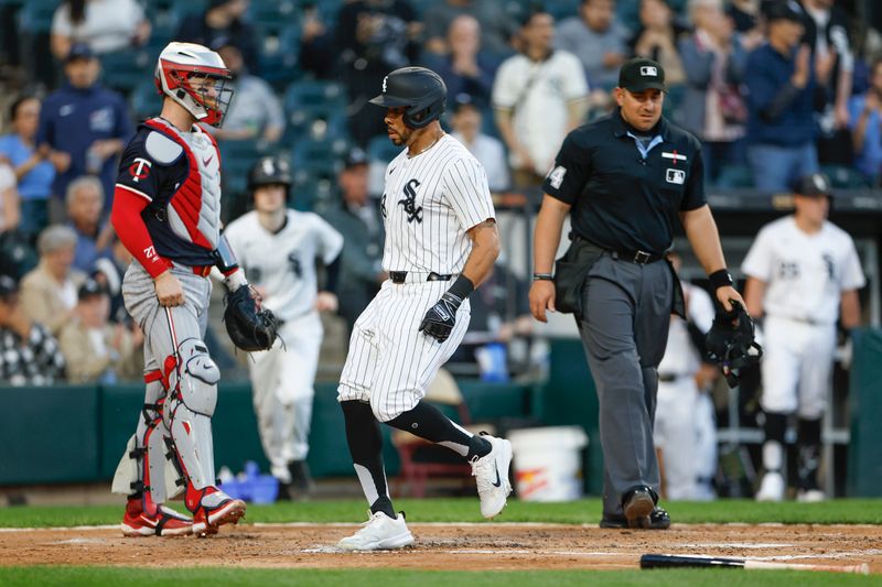 Apr 30, 2024; Chicago, Illinois, USA; Chicago White Sox outfielder Tommy Pham (28) scores against the Minnesota Twins during the third inning at Guaranteed Rate Field. Mandatory Credit: Kamil Krzaczynski-USA TODAY Sports