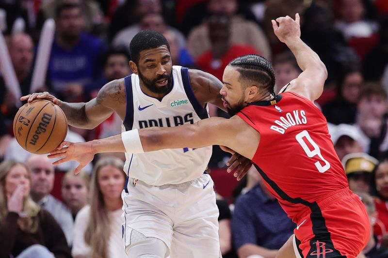 HOUSTON, TEXAS - JANUARY 01: Dillon Brooks #9 of the Houston Rockets pressures Kyrie Irving #11 of the Dallas Mavericks during the second half at Toyota Center on January 01, 2025 in Houston, Texas. NOTE TO USER: User expressly acknowledges and agrees that, by downloading and or using this photograph, User is consenting to the terms and conditions of the Getty Images License Agreement. (Photo by Alex Slitz/Getty Images)