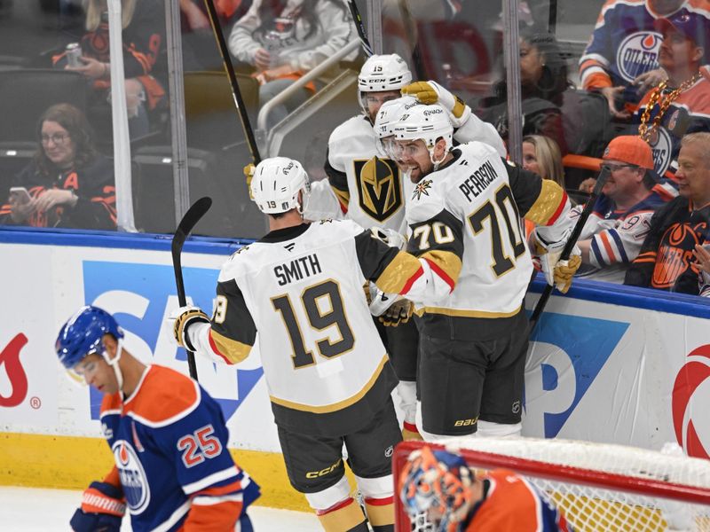 May 10, 2025; Edmonton, Alberta, CAN; Vegas Golden Knights right winger Reilly Smith (19) and left winger Tanner Pearson (70) celebrate a goal on Edmonton Oilers goalie Stuart Skinner (74) during the second period in game three of the second round of the 2025 Stanley Cup Playoffs at Rogers Place. Mandatory Credit: Walter Tychnowicz-Imagn Images