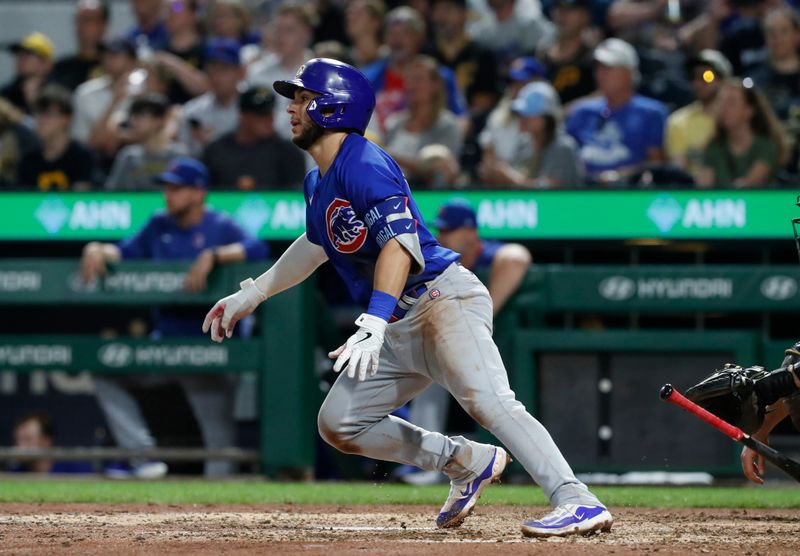 Aug 25, 2023; Pittsburgh, Pennsylvania, USA; Chicago Cubs third baseman Nick Madrigal (1) hits single against the Pittsburgh Pirates during the eighth inning at PNC Park. Pittsburgh won 2-1. Mandatory Credit: Charles LeClaire-USA TODAY Sports