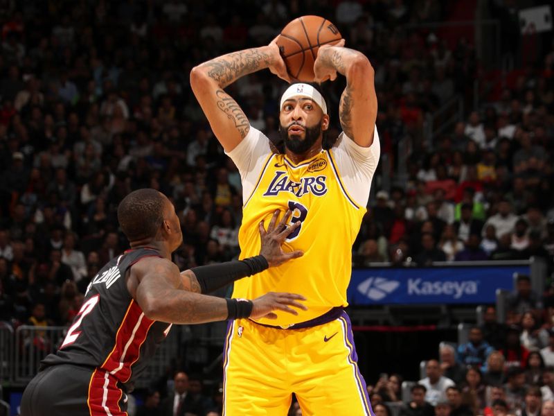 MIAMI, FL - DECEMBER 4: Anthony Davis #3 of the Los Angeles Lakers looks to pass the ball during the game against the Miami Heat on December 4, 2024 at Kaseya Center in Miami, Florida. NOTE TO USER: User expressly acknowledges and agrees that, by downloading and or using this Photograph, user is consenting to the terms and conditions of the Getty Images License Agreement. Mandatory Copyright Notice: Copyright 2024 NBAE (Photo by Issac Baldizon/NBAE via Getty Images)