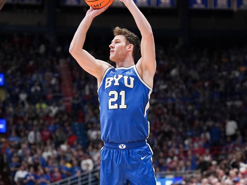 Feb 27, 2024; Lawrence, Kansas, USA; Brigham Young Cougars guard Trevin Knell (21) shoots a three point attempt against the Brigham Young Cougars during the first half at Allen Fieldhouse. Mandatory Credit: Denny Medley-USA TODAY Sports