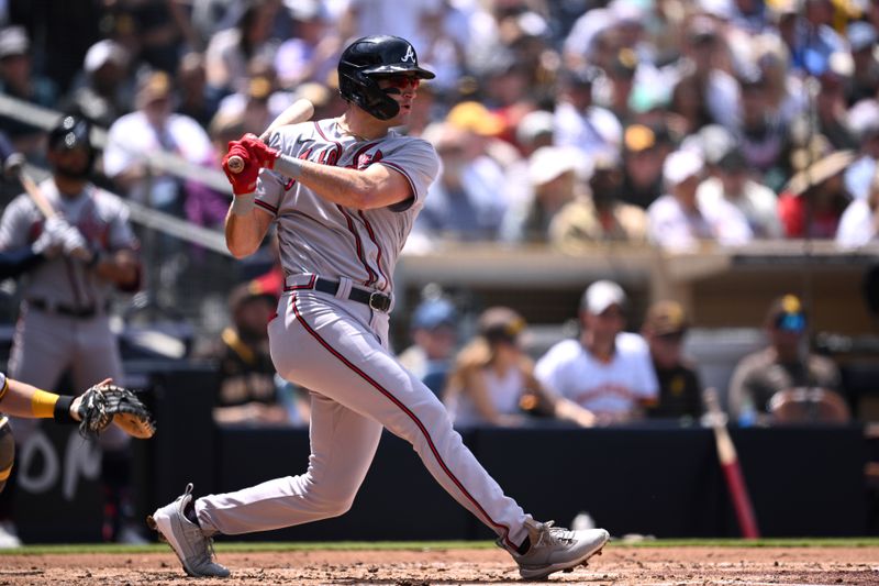 Apr 19, 2023; San Diego, California, USA; Atlanta Braves center fielder Sam Hilliard (14) hits a single against the San Diego Padres during the third inning at Petco Park. Mandatory Credit: Orlando Ramirez-USA TODAY Sports