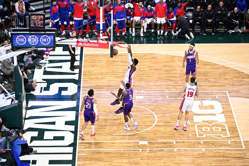 EAST LANSING, MI - OCTOBER 8: Jalen Duren #0 of the Detroit Pistons dunks the ball during the game against the Phoenix Suns during a NBA Preseason game on October 8, 2024 at the Breslin Center in East Lansing, Michigan. NOTE TO USER: User expressly acknowledges and agrees that, by downloading and/or using this photograph, User is consenting to the terms and conditions of the Getty Images License Agreement. Mandatory Copyright Notice: Copyright 2024 NBAE (Photo by Chris Schwegler/NBAE via Getty Images)