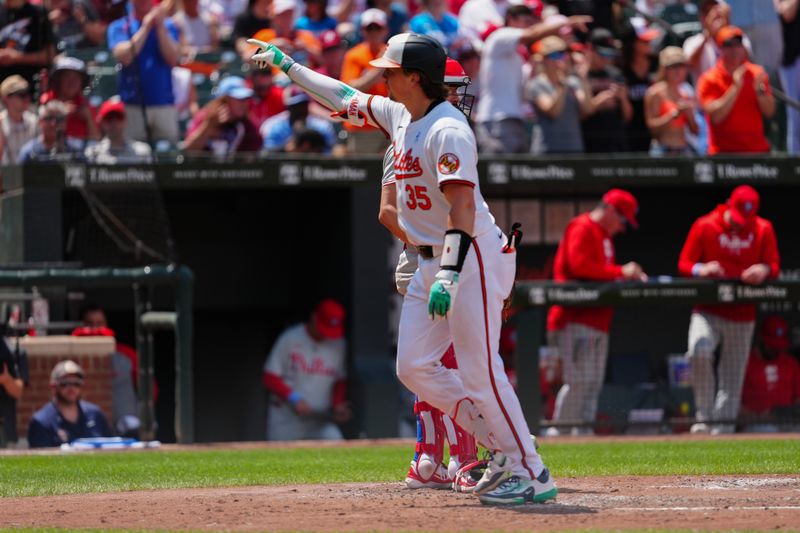 Jun 16, 2024; Baltimore, Maryland, USA; Baltimore Orioles catcher Adley Rutschman (35) reacts to hitting a home run as he crosses home plate against the Philadelphia Phillies during the third inning at Oriole Park at Camden Yards. Mandatory Credit: Gregory Fisher-USA TODAY Sports