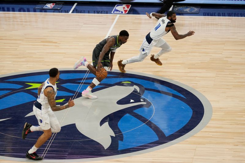 MINNEAPOLIS, MN - MAY 30: Anthony Edwards #5 of the Minnesota Timberwolves dribbles the ball during the game against the Dallas Mavericks during Game 5 of the Western Conference Finals of the 2024 NBA Playoffs on May 30, 2024 at Target Center in Minneapolis, Minnesota. NOTE TO USER: User expressly acknowledges and agrees that, by downloading and or using this Photograph, user is consenting to the terms and conditions of the Getty Images License Agreement. Mandatory Copyright Notice: Copyright 2024 NBAE (Photo by Jordan Johnson/NBAE via Getty Images)