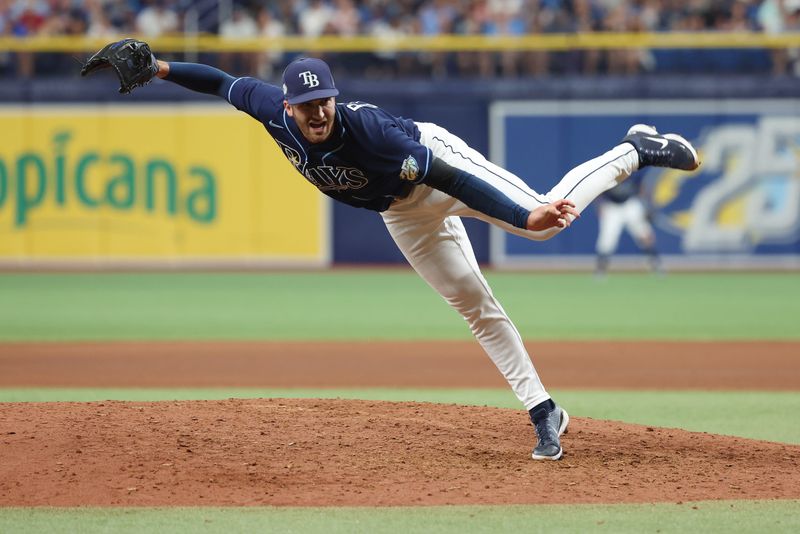 May 27, 2023; St. Petersburg, Florida, USA; Tampa Bay Rays relief pitcher Colin Poche (38) throws a pitch during the fifth inning against the Los Angeles Dodgers  at Tropicana Field. Mandatory Credit: Kim Klement-USA TODAY Sports