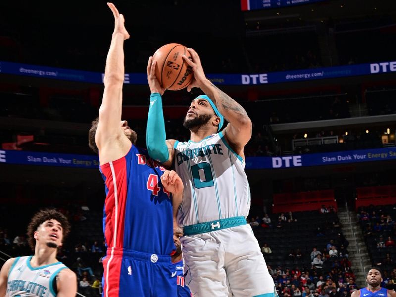 DETROIT, MI - JANUARY 24: Miles Bridges #0 of the Charlotte Hornets drives to the basket during the game against the Detroit Pistons on January 24, 2024 at Little Caesars Arena in Detroit, Michigan. NOTE TO USER: User expressly acknowledges and agrees that, by downloading and/or using this photograph, User is consenting to the terms and conditions of the Getty Images License Agreement. Mandatory Copyright Notice: Copyright 2024 NBAE (Photo by Chris Schwegler/NBAE via Getty Images)