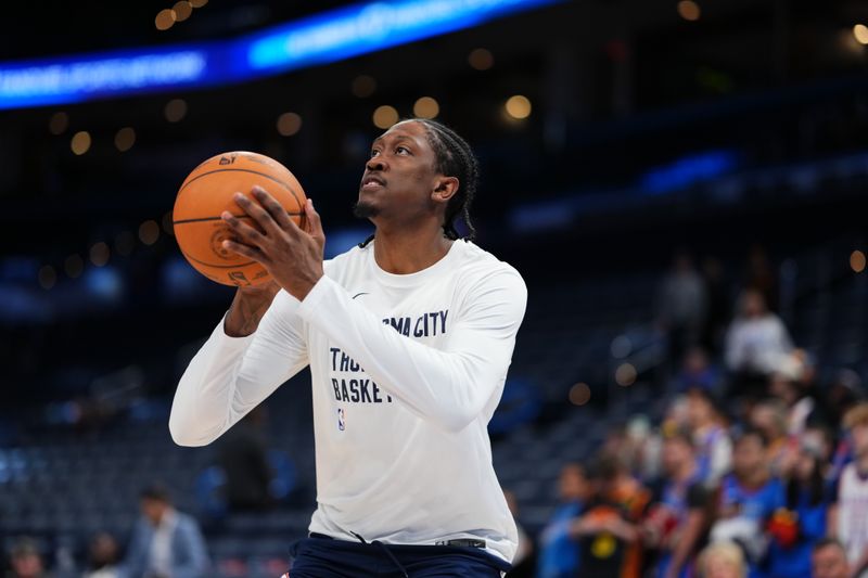 OKLAHOMA CITY, OK - JANUARY 3:  Jalen Williams #8 of the Oklahoma City Thunder warms up before the game against the New York Knicks on January 3, 2025 at Paycom Center in Oklahoma City, Oklahoma. NOTE TO USER: User expressly acknowledges and agrees that, by downloading and or using this photograph, User is consenting to the terms and conditions of the Getty Images License Agreement. Mandatory Copyright Notice: Copyright 2025 NBAE (Photo by Cooper Neill/NBAE via Getty Images)