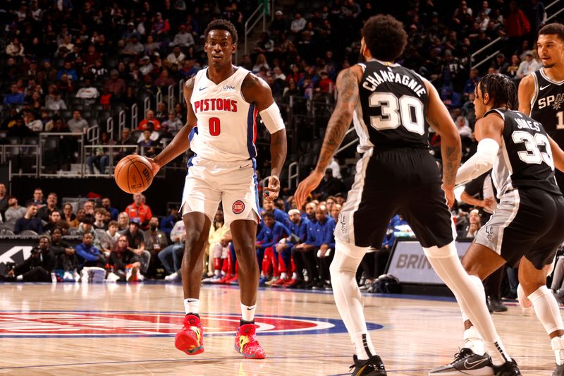 DETROIT, MI - JANUARY 10:  Jalen Duren #0 of the Detroit Pistons handles the ball during the game against the San Antonio Spurs on January 10, 2024 at Little Caesars Arena in Detroit, Michigan. NOTE TO USER: User expressly acknowledges and agrees that, by downloading and/or using this photograph, User is consenting to the terms and conditions of the Getty Images License Agreement. Mandatory Copyright Notice: Copyright 2024 NBAE (Photo by Brian Sevald/NBAE via Getty Images)