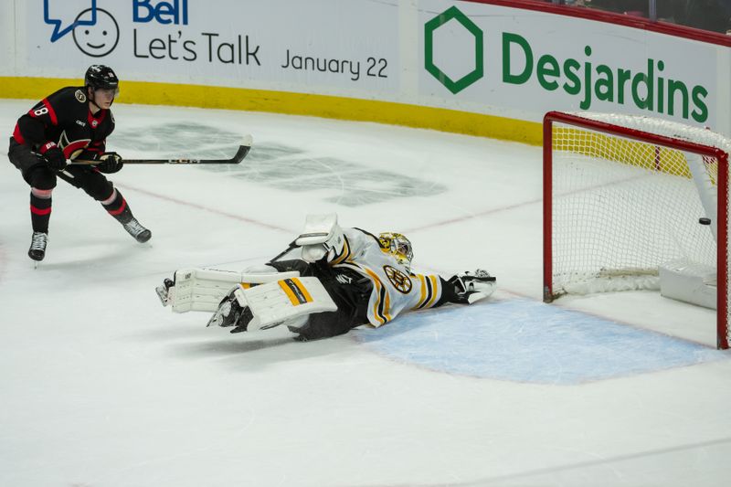 Jan 18, 2025; Ottawa, Ontario, CAN; Ottawa Senators center Tim Stutzle (18) scores against Boston Bruins goalie Jeremy Swayman (1) in a shootout at the Canadian Tire Centre. Mandatory Credit: Marc DesRosiers-Imagn Images