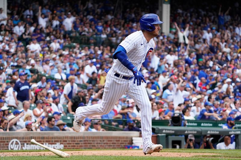 Jul 15, 2023; Chicago, Illinois, USA; Chicago Cubs center fielder Cody Bellinger (24) hits a grand slam home run against the Boston Red Sox during the third inning at Wrigley Field. Mandatory Credit: David Banks-USA TODAY Sports