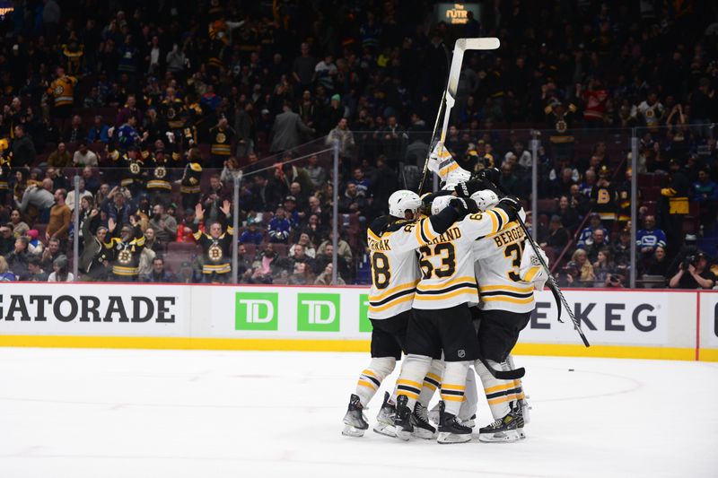 Feb 25, 2023; Vancouver, British Columbia, CAN; Boston Bruins goaltender Linus Ullmark (35) celebrates his empty net goal during the third period at Rogers Arena. Mandatory Credit: Anne-Marie Sorvin-USA TODAY Sports