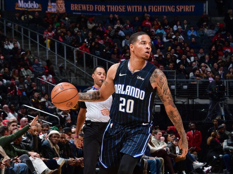 ATLANTA, GA - JANUARY 17: Markelle Fultz #20 of the Orlando Magic handles the ball during the game  on January 17, 2024 at State Farm Arena in Atlanta, Georgia.  NOTE TO USER: User expressly acknowledges and agrees that, by downloading and/or using this Photograph, user is consenting to the terms and conditions of the Getty Images License Agreement. Mandatory Copyright Notice: Copyright 2024 NBAE (Photo by Scott Cunningham/NBAE via Getty Images)