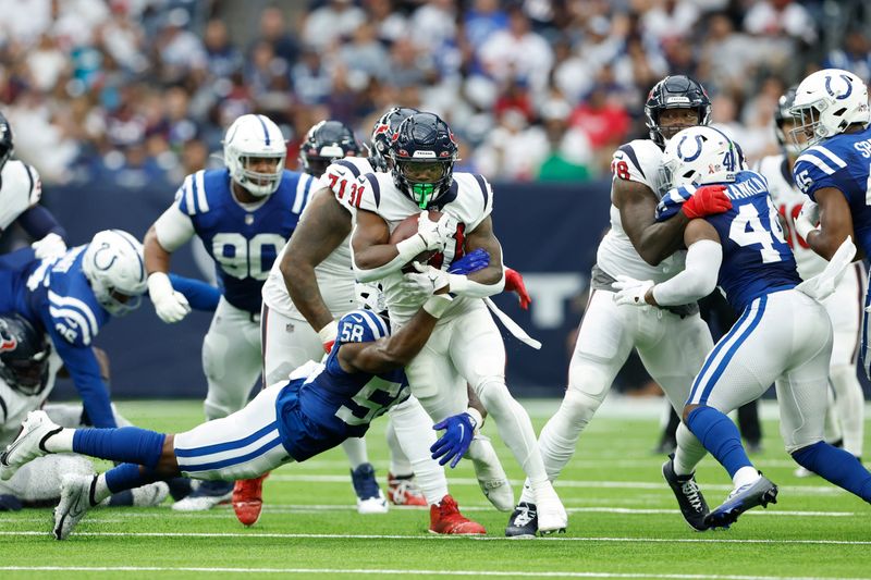 Houston Texans running back Dameon Pierce (31) carries the ball during an NFL football game against the Indianapolis Colts on Sunday, September 11, 2022, in Houston. (AP Photo/Matt Patterson)