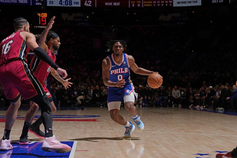 PHILADELPHIA, PA - MARCH 18: Tyrese Maxey #0 of the Philadelphia 76ers dribbles the ball during the game against the Miami Heat on March 18, 2024 at the Wells Fargo Center in Philadelphia, Pennsylvania NOTE TO USER: User expressly acknowledges and agrees that, by downloading and/or using this Photograph, user is consenting to the terms and conditions of the Getty Images License Agreement. Mandatory Copyright Notice: Copyright 2024 NBAE (Photo by Jesse D. Garrabrant/NBAE via Getty Images)