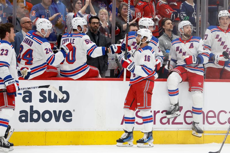 Apr 28, 2024; Washington, District of Columbia, USA; New York Rangers center Vincent Trocheck (16) celebrates with teammates after scoring a goal against the Washington Capitals in the first period in game four of the first round of the 2024 Stanley Cup Playoffs at Capital One Arena. Mandatory Credit: Geoff Burke-USA TODAY Sports