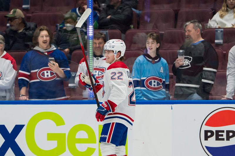 Mar 21, 2024; Vancouver, British Columbia, CAN; Montreal Canadiens forward Cole Caufield (22) smiles during warm up prior to a game against the Vancouver Canucks at Rogers Arena. Mandatory Credit: Bob Frid-USA TODAY Sports