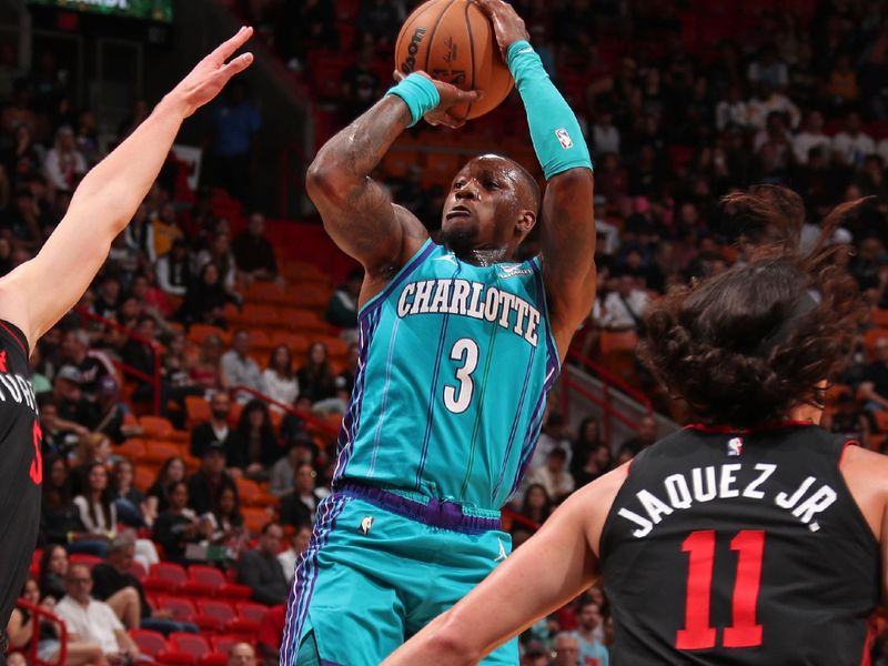 MIAMI, FL - JANUARY 14: Terry Rozier #3 of the Charlotte Hornets shoots the ball during the game against the Miami Heat on January 14, 2024 at Kaseya Center in Miami, Florida. NOTE TO USER: User expressly acknowledges and agrees that, by downloading and or using this Photograph, user is consenting to the terms and conditions of the Getty Images License Agreement. Mandatory Copyright Notice: Copyright 2024 NBAE (Photo by Issac Baldizon/NBAE via Getty Images)