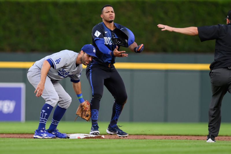 Jul 12, 2024; Detroit, Michigan, USA;  Detroit Tigers outfielder Wenceel Perez (46) looks to the umpire to see if he was safe at second base as Los Angeles Dodgers second baseman Chris Taylor (3) puts on the tag in the seventh inning at Comerica Park. Mandatory Credit: Lon Horwedel-USA TODAY Sports