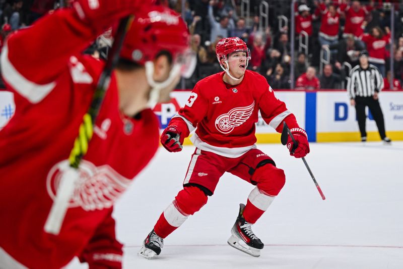 Nov 27, 2024; Detroit, Michigan, USA; Detroit Red Wings left wing Lucas Raymond (23) celebrates after his game winning goal in overtime against the Calgary Flames at Little Caesars Arena. Mandatory Credit: Tim Fuller-Imagn Images