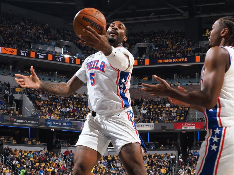 INDIANAPOLIS, IN - OCTOBER 27: Andre Drummond #5 of the Philadelphia 76ers rebounds during the game against the Indiana Pacers on October 27, 2024 at Gainbridge Fieldhouse in Indianapolis, Indiana. NOTE TO USER: User expressly acknowledges and agrees that, by downloading and or using this Photograph, user is consenting to the terms and conditions of the Getty Images License Agreement. Mandatory Copyright Notice: Copyright 2024 NBAE (Photo by Ron Hoskins/NBAE via Getty Images)