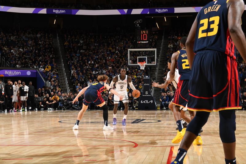 SAN FRANCISCO, CA - NOVEMBER 25: Dennis Schroder #17 of the Brooklyn Nets handles the ball during the game against the Golden State Warriors on November 25, 2024 at Chase Center in San Francisco, California. NOTE TO USER: User expressly acknowledges and agrees that, by downloading and or using this photograph, user is consenting to the terms and conditions of Getty Images License Agreement. Mandatory Copyright Notice: Copyright 2024 NBAE (Photo by Noah Graham/NBAE via Getty Images)