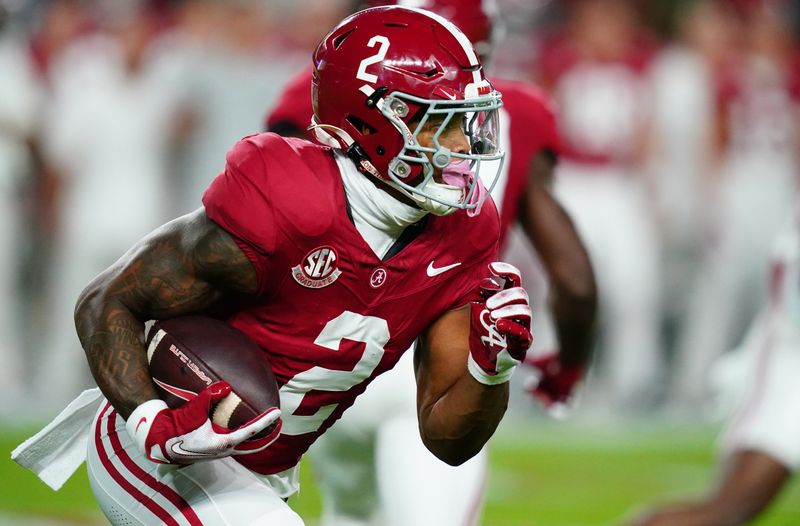 Nov 4, 2023; Tuscaloosa, Alabama, USA; Alabama Crimson Tide running back Jase McClellan (2) carries the ball against the LSU Tigers during the first quarter at Bryant-Denny Stadium. Mandatory Credit: John David Mercer-USA TODAY Sports