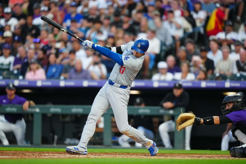 Jun 19, 2024; Denver, Colorado, USA; Los Angeles Dodgers designated hitter Shohei Ohtani (17) swings the bat in the sixth inning against the Colorado Rockies at Coors Field. Mandatory Credit: Ron Chenoy-USA TODAY Sports