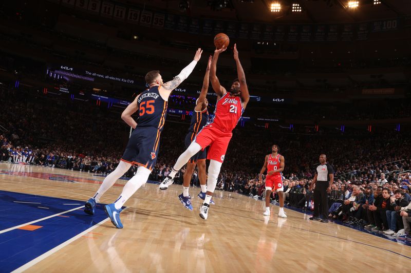 NEW YORK, NY - APRIL 22:  Joel Embiid #21 of the Philadelphia 76ers shoots the ball during the game  against Isaiah Hartenstein #55 of the New York Knicks during Round 1 Game 2 of the 2024 NBA Playoffs on April 22, 2024 at Madison Square Garden in New York City, New York.  NOTE TO USER: User expressly acknowledges and agrees that, by downloading and or using this photograph, User is consenting to the terms and conditions of the Getty Images License Agreement. Mandatory Copyright Notice: Copyright 2024 NBAE  (Photo by Nathaniel S. Butler/NBAE via Getty Images)