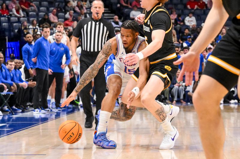 Mar 14, 2025; Nashville, TN, USA;  Florida Gators guard Alijah Martin (15) dribbles the ball against the Missouri Tigers during the first half at Bridgestone Arena. Mandatory Credit: Steve Roberts-Imagn Images