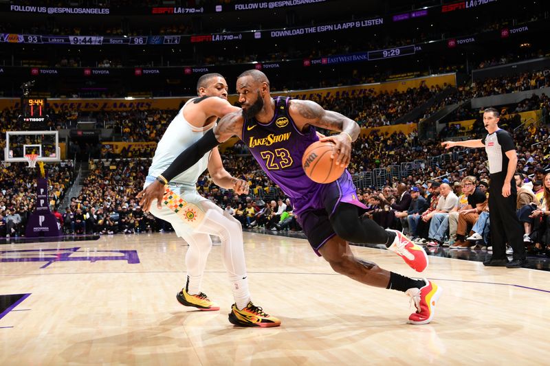 LOS ANGELES, CA - JANUARY 13: LeBron James #23 of the Los Angeles Lakers drives to the basket during the game against the San Antonio Spurs on January 13, 2025 at Crypto.Com Arena in Los Angeles, California. NOTE TO USER: User expressly acknowledges and agrees that, by downloading and/or using this Photograph, user is consenting to the terms and conditions of the Getty Images License Agreement. Mandatory Copyright Notice: Copyright 2025 NBAE (Photo by Adam Pantozzi/NBAE via Getty Images)