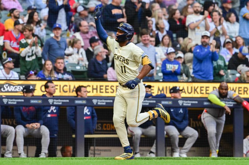 Jun 10, 2025; Milwaukee, Wisconsin, USA; Milwaukee Brewers center fielder Jackson Chourio (11) reacts after hitting a two run home run in the third inning against the Atlanta Braves at American Family Field. Mandatory Credit: Benny Sieu-Imagn Images
