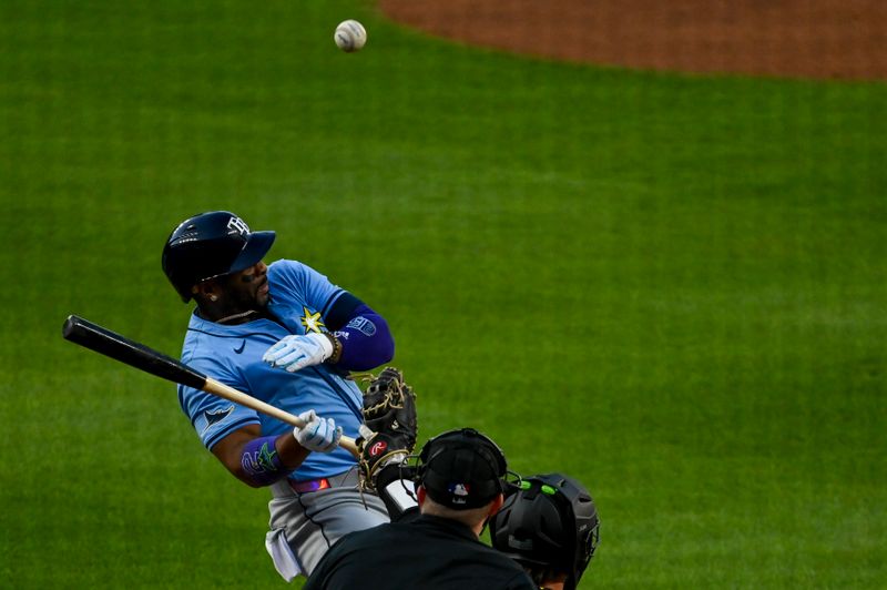 May 31, 2024; Baltimore, Maryland, USA;  Tampa Bay Rays first baseman Yandy Díaz (2) reacts as a inside pitch would off the batt in the second inning against the Baltimore Orioles at Oriole Park at Camden Yards. Mandatory Credit: Tommy Gilligan-USA TODAY Sports