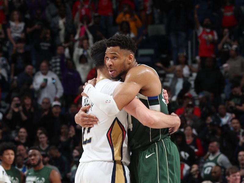 NEW ORLEANS, LA - MARCH 28: Larry Nance Jr. #22 of the New Orleans Pelicans & Giannis Antetokounmpo #34 of the Milwaukee Bucks embrace after the game on March 28, 2024 at the Smoothie King Center in New Orleans, Louisiana. NOTE TO USER: User expressly acknowledges and agrees that, by downloading and or using this Photograph, user is consenting to the terms and conditions of the Getty Images License Agreement. Mandatory Copyright Notice: Copyright 2024 NBAE (Photo by Layne Murdoch Jr./NBAE via Getty Images)